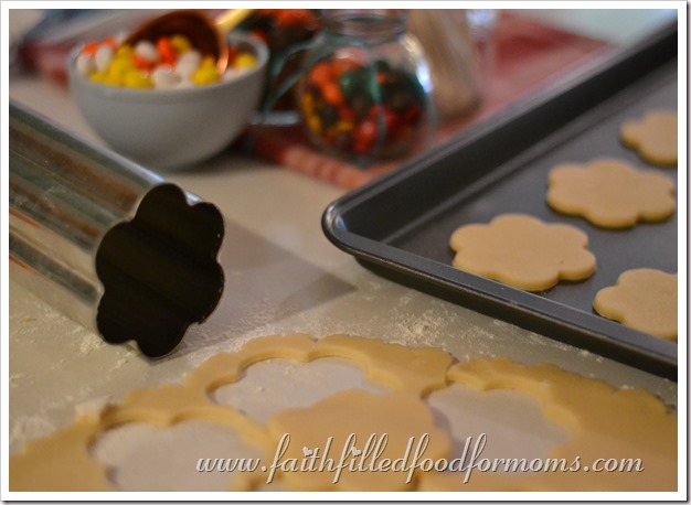 autumn baking for kids Cut out cookies on a baking sheet