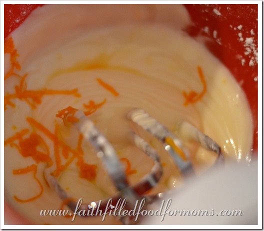 Fall Baking Recipes Orange Frosting ingredients in a bowl for mixing