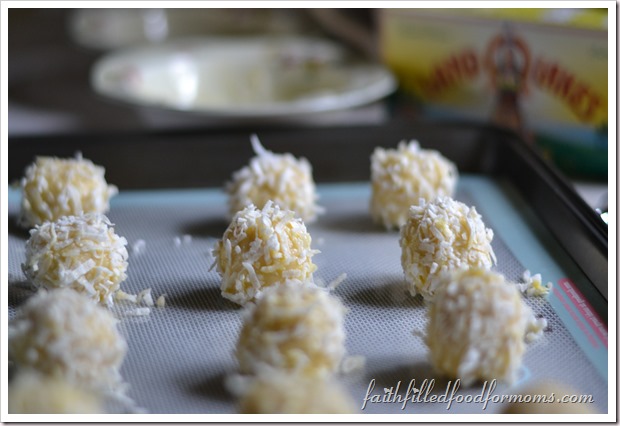 Coconut Lemon Thumbprint Meringue Cookie Recipe rolled cookies with coconut on them