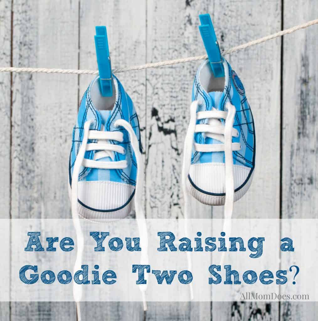 Baby shoes hanging on the clothesline.