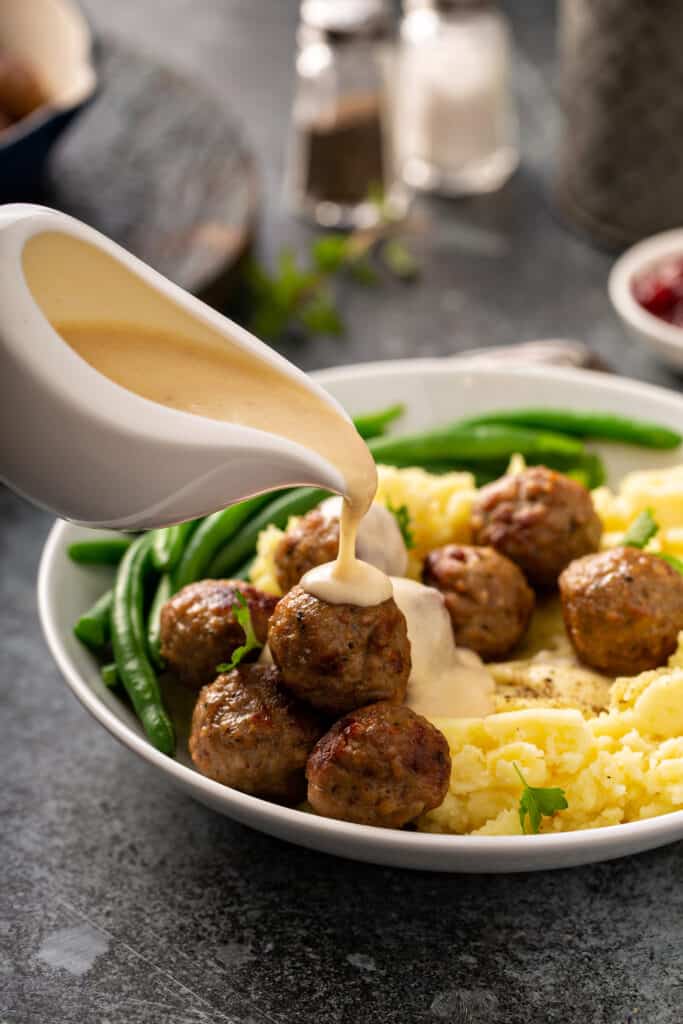 Easy Homemade Swedish Meatball Recipe Swedish meatballs with mashed potatoes and green beans