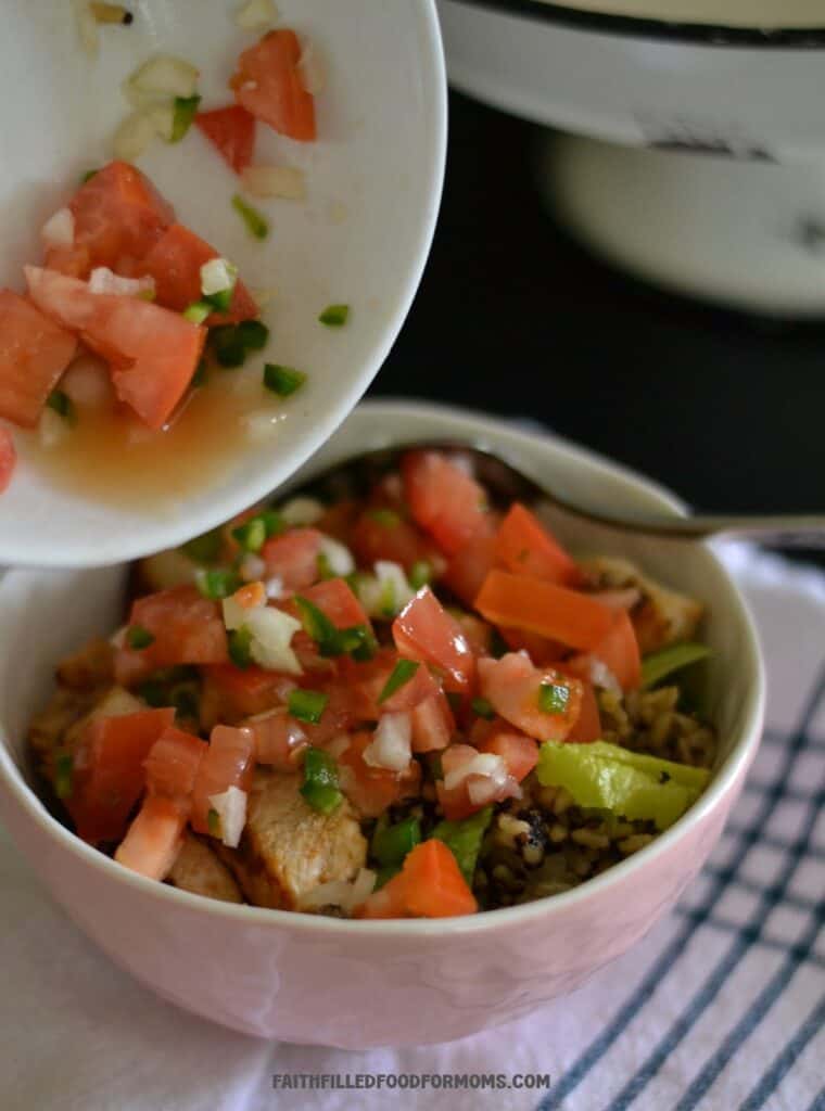 Burrito bowl with leftover taco chicken Adding Homemade Pico de Gallo to Chicken Burrito Bowl to top it off!