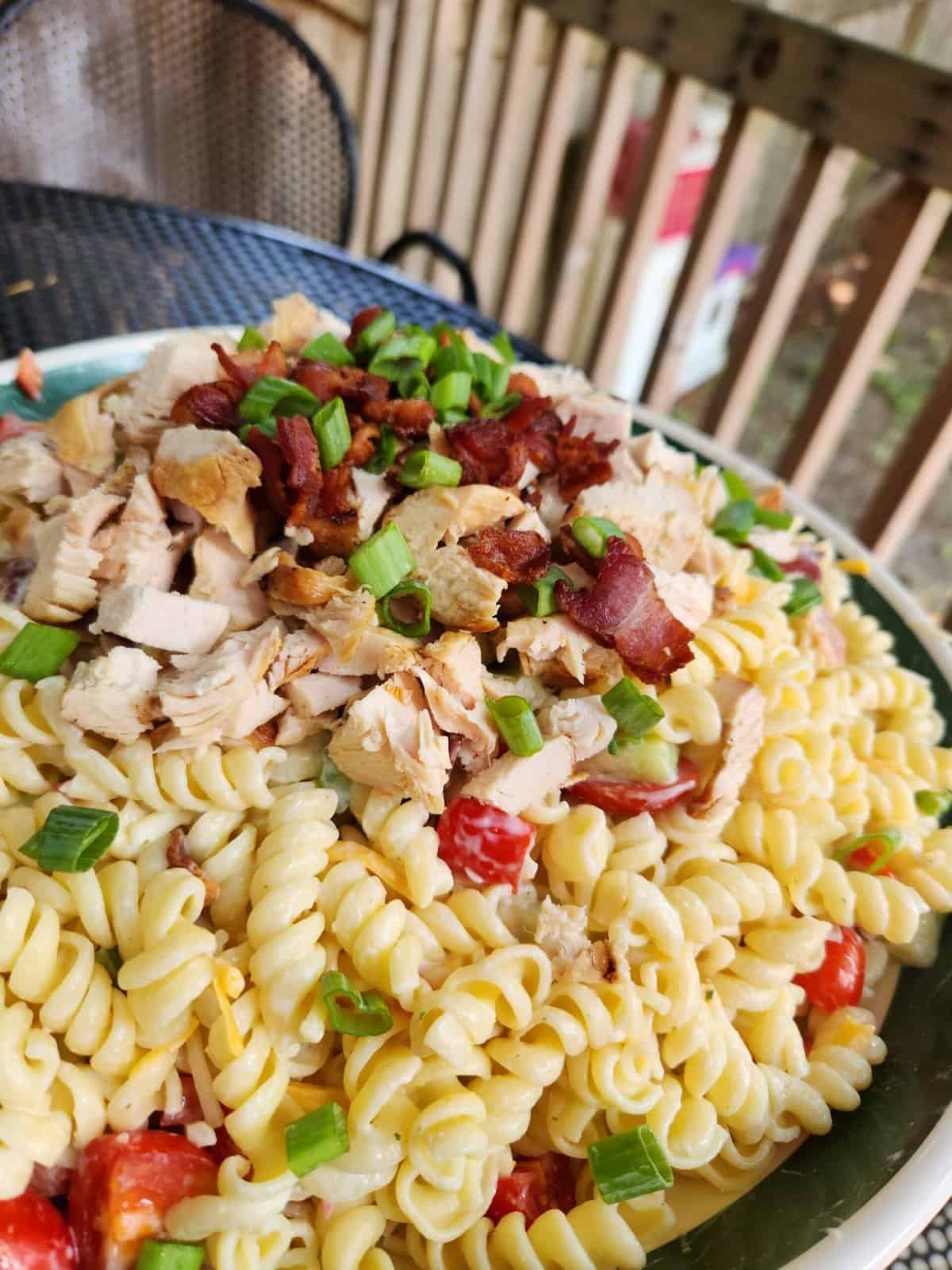 Chicken Bacon Ranch Pasta Salad Recipe on a table ourdoors