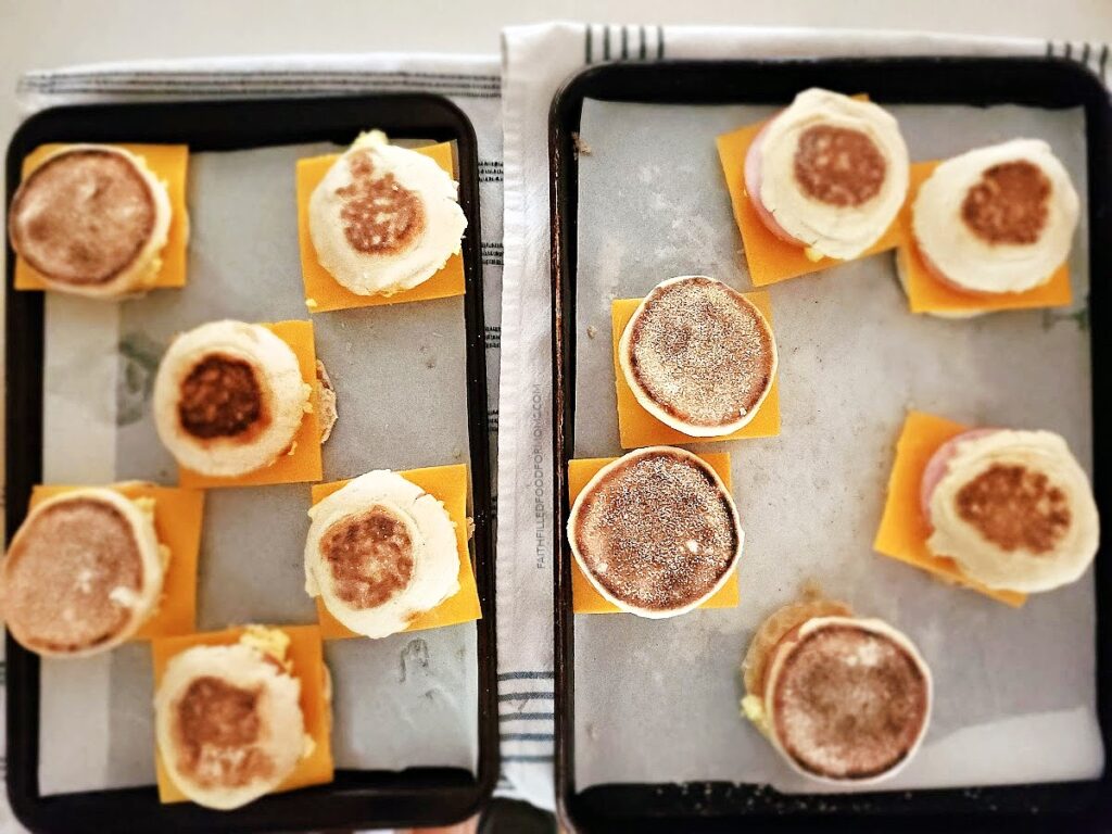 breakfast sandwiches for the freezer 2 baking trays with assembled make-ahead breakfast sandwiches