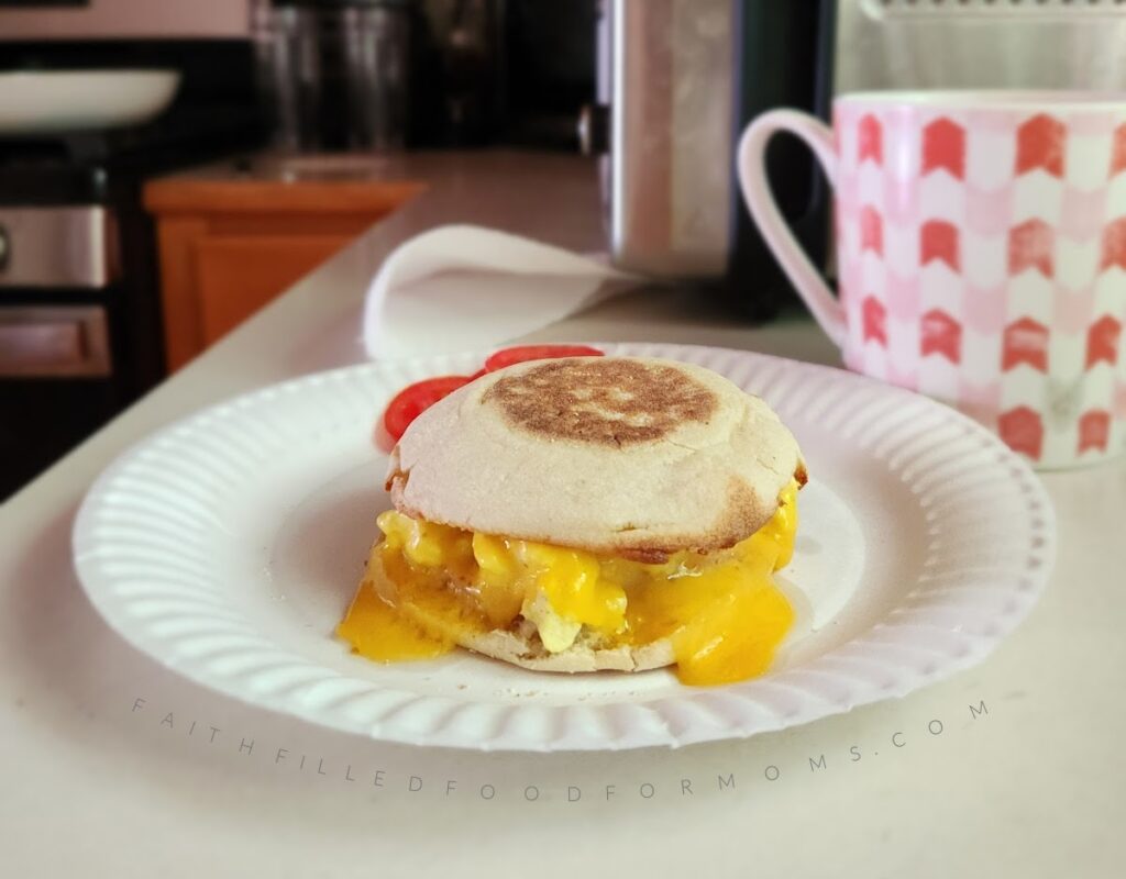 Easy Make Aheard Breakfast Sandwiches Canadian bacon breakfast sandwiches and coffee.