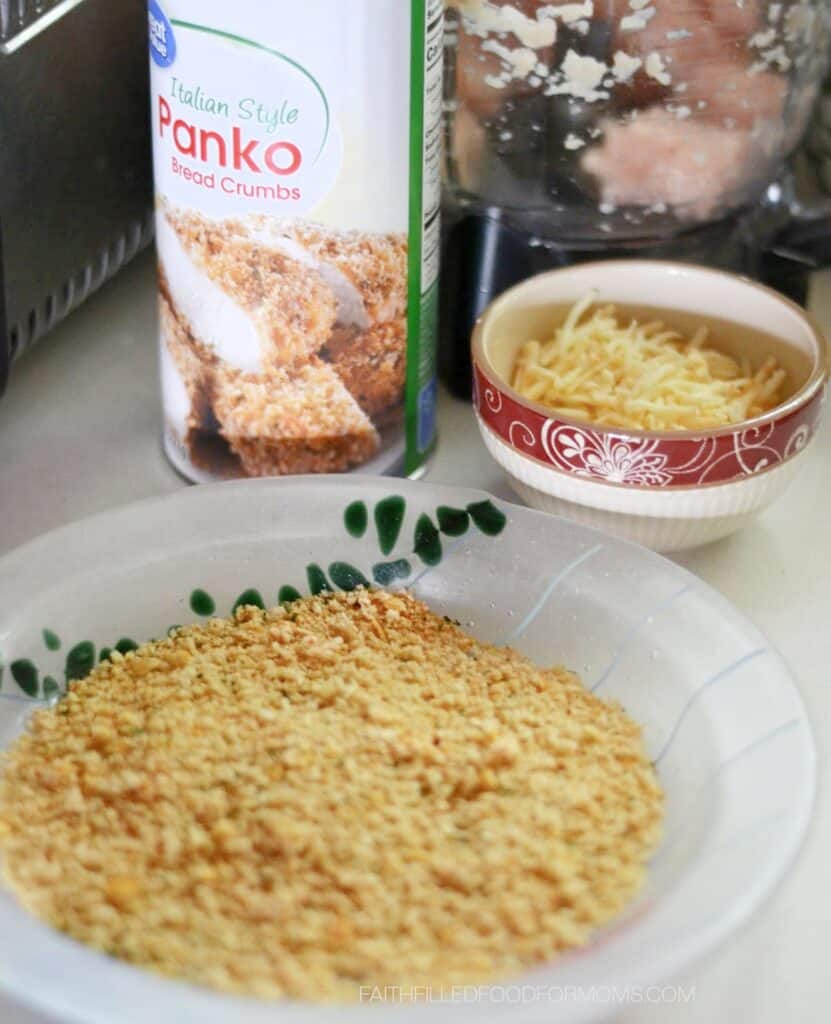 homemade chicken nuggets with ground chicken Picture of ingredients. Panko Breadcrumbs, cheese, ground chicken and an egg